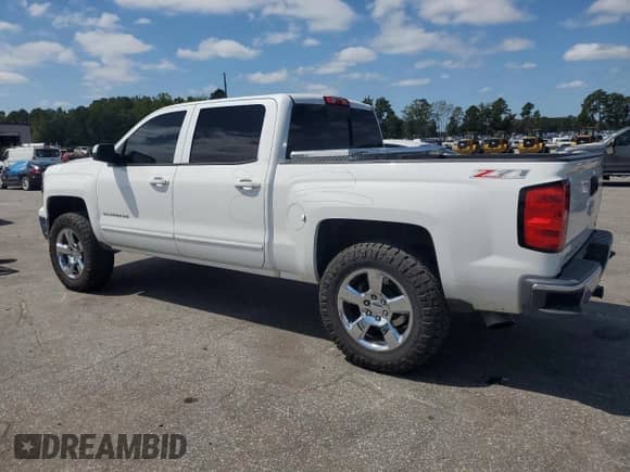 2015 Chevrolet Silverado 1500 LT с VIN 3GCUKRECXFG465019, выставлен на аукционе Copart как лот 80157265 с пробегом 129 761 миль миль и Списание • Salvage title. История ставок и продаж доступна на DreamBid. Изображение 2.