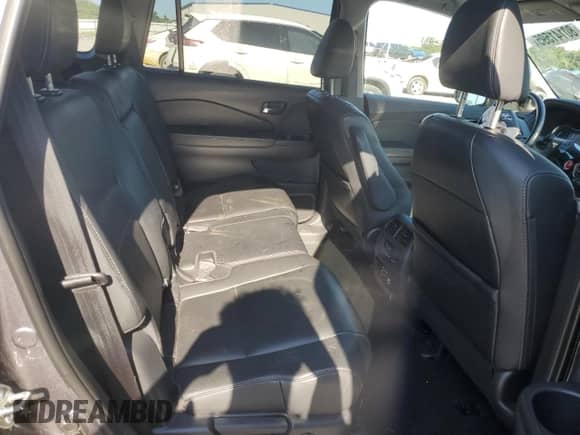 2016 Honda Pilot Touring с VIN 5FNYF5H91GB036101, выставлен на аукционе Copart как лот 80141595 с пробегом 104 928 миль миль и Списание • Salvage title. История ставок и продаж доступна на DreamBid. Изображение 11.