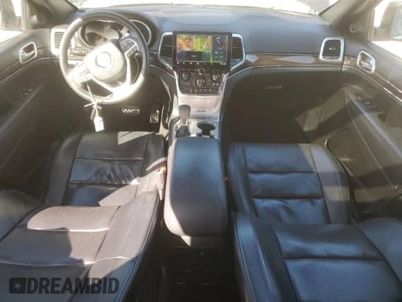 2016 Jeep Grand Cherokee Overland with VIN 1C4RJFCG0GC443824, listed as a Copart auction lot 82598385 with 92,696 mi miles and Salvage title. Bid and sale history available at DreamBid. Image 8.