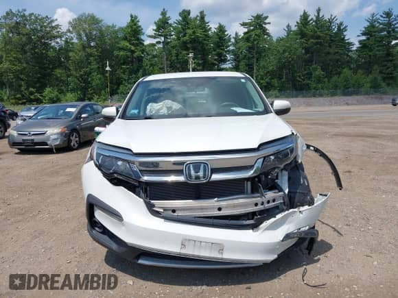 2020 Honda Pilot EX z VIN 5FNYF6H37LB047115, wystawiony jako IAAI lot #42833904 z przebiegiem 77 857 mil mil oraz . Historia ofert i sprzedaży dostępna na DreamBid. Obrazek 13.