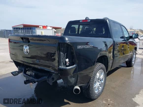 2022 Ram 1500 Big Horn with VIN 1C6RREFT1NN190128, listed as a IAAI auction lot 41797356 with 56,217 mi miles and . Bid and sale history available at DreamBid. Image 4.