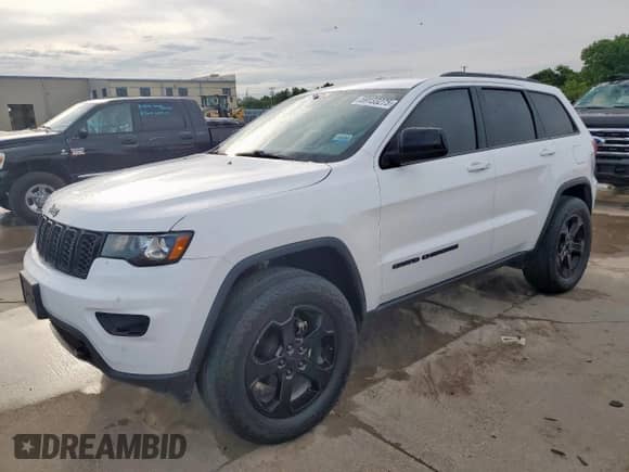 2018 Jeep Grand Cherokee Laredo with VIN 1C4RJFAG0JC391539, listed as a Copart auction lot 59133275 with 230,320 mi miles and Clean title. Bid and sale history available at DreamBid. Image 1.