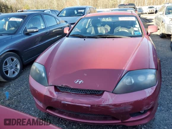2006 Hyundai Tiburon GT с VIN KMHHN65F06U204556, выставлен на аукционе Copart как лот 82749974 с пробегом 95 270 миль миль и На запчасти • Non repairable. История ставок и продаж доступна на DreamBid. Изображение 5.