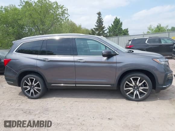 2020 Honda Pilot Elite с VIN 5FNYF6H00LB027472, выставлен на аукционе IAAI как лот 42253478 с пробегом 69 988 миль миль и . История ставок и продаж доступна на DreamBid. Изображение 13.