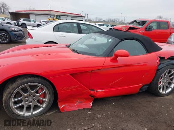 2005 Dodge Viper SRT-10 with VIN 1B3JZ65Z25V500516, listed as a IAAI auction lot 42000783 with 13,090 mi miles and . Bid and sale history available at DreamBid. Image 14.