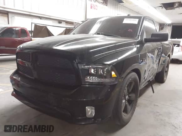2014 Ram 1500 Express z VIN 3C6JR6AT5EG142019, wystawiony jako IAAI lot #42909966 z przebiegiem 136 943 mil mil oraz . Historia ofert i sprzedaży dostępna na DreamBid. Obrazek 17.