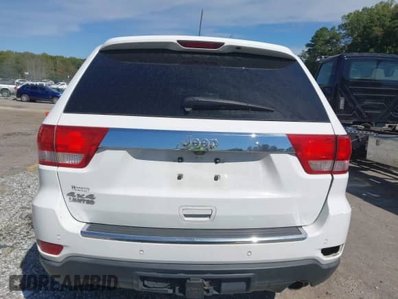 2013 Jeep Grand Cherokee Limited z VIN 1C4RJFBG8DC556272, wystawiony jako IAAI lot #43352592 z przebiegiem 118 793 mil mil oraz . Historia ofert i sprzedaży dostępna na DreamBid. Obrazek 16.