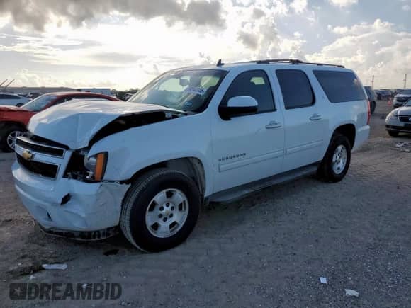 2012 Chevrolet Suburban LT с VIN 1GNSCJE00CR103229, выставлен на аукционе Copart как лот 69244645 с пробегом 135 345 миль миль и Списание • Salvage title. История ставок и продаж доступна на DreamBid. Изображение 1.