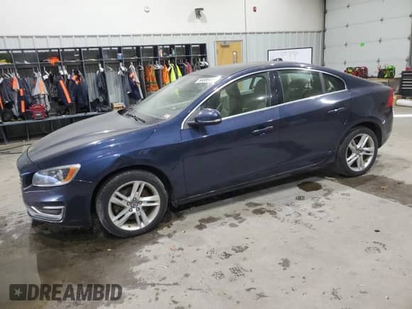 2014 Volvo S60 T5 z VIN YV1612FH8E1287504, wystawiony jako Copart lot #84885115 z przebiegiem 106 068 mil mil oraz Czysty tytuł • Clean title. Historia ofert i sprzedaży dostępna na DreamBid. Obrazek 1.
