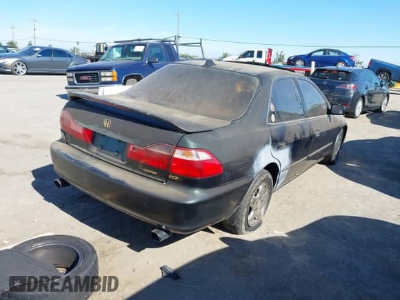 1999 Honda Accord EX with VIN 1HGCG1651XA010429, listed as a IAAI auction lot 42931580 with 453,774 mi miles and . Bid and sale history available at DreamBid. Image 4.