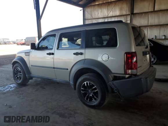 2008 Dodge Nitro SXT with VIN 1D8GT28K88W286116, listed as a Copart auction lot 56769675 with 211,006 mi miles and Salvage title. Bid and sale history available at DreamBid. Image 2.