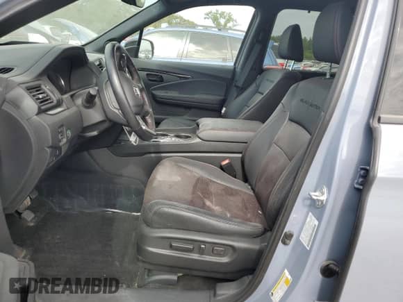 2024 Honda Passport Black Edition with VIN 5FNYF8H85RB009284, listed as a Copart auction lot 71893995 with 62,575 mi miles and Salvage title. Bid and sale history available at DreamBid. Image 7.
