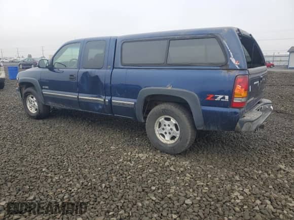 2002 Chevrolet Silverado 1500 LS z VIN 2GCEK19T621134585, wystawiony jako Copart lot #82629095 z przebiegiem 154 674 mil mil oraz Czysty tytuł • Clean title. Historia ofert i sprzedaży dostępna na DreamBid. Obrazek 2.