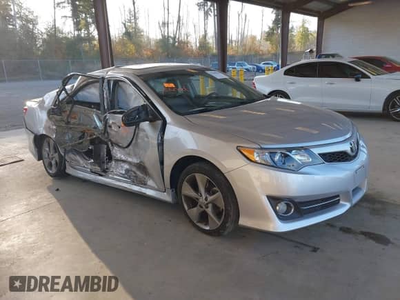 2014 Toyota Camry SE with VIN 4T1BF1FK6EU772715, listed as a IAAI auction lot 43309670 with 108,702 mi miles and . Bid and sale history available at DreamBid. Image 1.