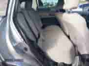 2022 Toyota Corolla Cross L with VIN 7MUAAAAG6NV010688, listed as a IAAI auction lot 41212520 with 50,075 mi miles and . Bid and sale history available at DreamBid. Image 8.