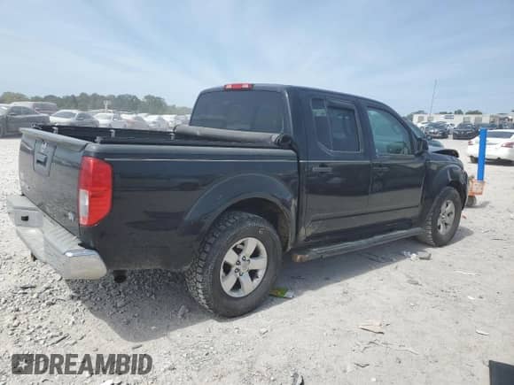 2013 Nissan Frontier SV with VIN 1N6AD0ERXDN764203, listed as a Copart auction lot 70687385 with 202,853 mi miles and Salvage title. Bid and sale history available at DreamBid. Image 3.