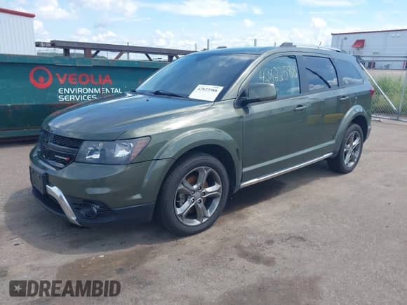 2017 Dodge Journey Crossroad Plus with VIN 3C4PDDGG8HT696084, listed as a IAAI auction lot 42822588 with 73,368 mi miles and . Bid and sale history available at DreamBid. Image 2.