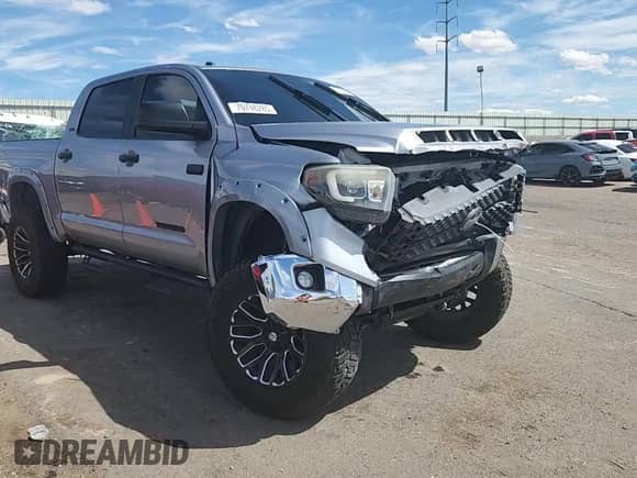2019 Toyota Tundra SR5 с VIN 5TFDY5F19KX803083, выставлен на аукционе Copart как лот 70748285 с пробегом Не указан миль и Списание • Salvage title. История ставок и продаж доступна на DreamBid. Изображение 13.
