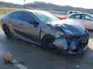 2021 Toyota Camry Hybrid XSE with VIN 4T1K31AK2MU023604, listed as a IAAI auction lot 41476057 with 26,211 mi miles and . Bid and sale history available at DreamBid. Image 1.