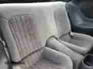 2001 Chevrolet Camaro z VIN 2G1FP22K612105828, wystawiony jako Copart lot #87356594 z przebiegiem 169 036 mil mil oraz Czysty tytuł • Clean title. Historia ofert i sprzedaży dostępna na DreamBid. Obrazek 10.