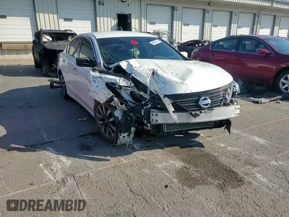 2016 Nissan Altima SV z VIN 1N4AL3AP9GC221619, wystawiony jako Copart lot #64574715 z przebiegiem 121 908 mil mil oraz Szkoda całkowita • Salvage title. Historia ofert i sprzedaży dostępna na DreamBid. Obrazek 14.
