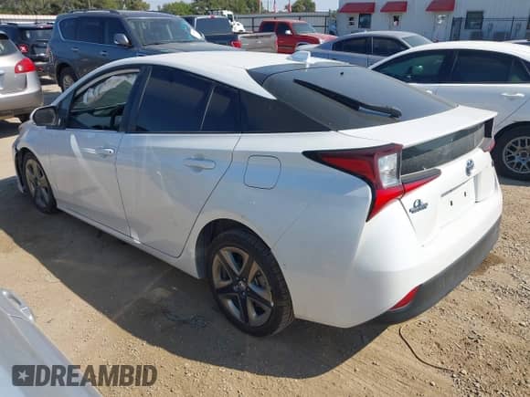 2021 Toyota Prius Limited with VIN JTDKAMFU9M3130578, listed as a IAAI auction lot 43236398 with 258,496 mi miles and . Bid and sale history available at DreamBid. Image 3.
