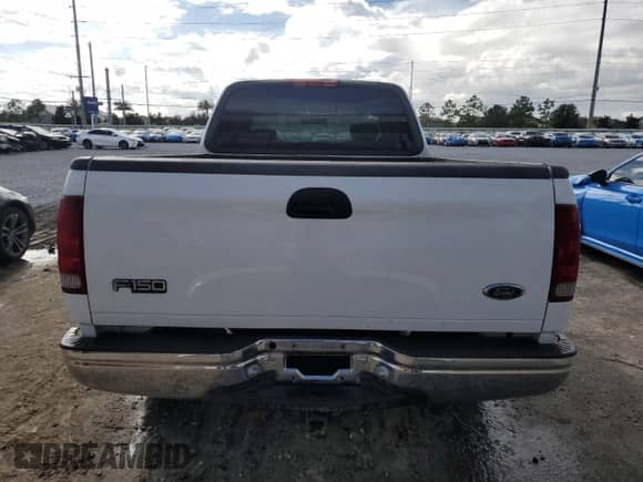 2002 Ford F-150 XL with VIN 1FTRX17LX2KC01615, listed as a Copart auction lot 85391495 with 176,921 mi miles and Salvage title. Bid and sale history available at DreamBid. Image 6.