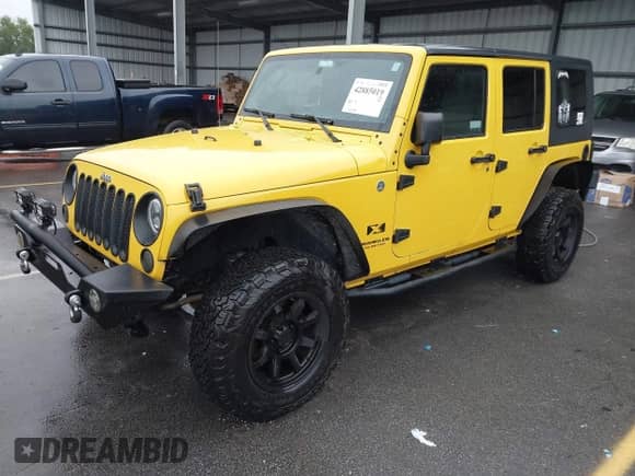 2008 Jeep Wrangler Unlimited X with VIN 1J8GA39108L605874, listed as a IAAI auction lot 42885019 with 167,693 mi miles and . Bid and sale history available at DreamBid. Image 2.