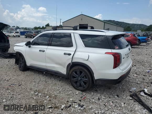 2023 Hyundai Palisade XRT z VIN KM8R3DGE9PU629892, wystawiony jako Copart lot #64610905 z przebiegiem 52 268 mil mil oraz Szkoda całkowita • Salvage title. Historia ofert i sprzedaży dostępna na DreamBid. Obrazek 2.
