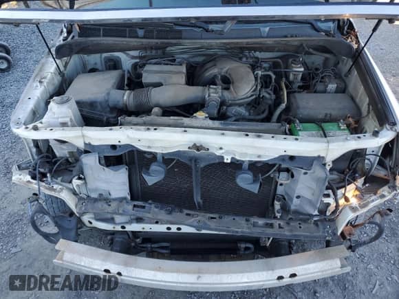 2012 Toyota Tundra z VIN 5TFRU5F1XCX027582, wystawiony jako Copart lot #85649634 z przebiegiem 267 030 mil mil oraz Szkoda całkowita • Salvage title. Historia ofert i sprzedaży dostępna na DreamBid. Obrazek 11.