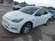 2022 Tesla Model Y Long Range z VIN 7SAYGDEE8NF441090, wystawiony jako IAAI lot #43139344 z przebiegiem 37 850 mil mil oraz . Historia ofert i sprzedaży dostępna na DreamBid. Obrazek 17.