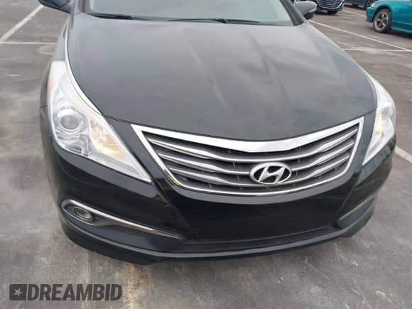 2015 Hyundai Azera z VIN KMHFG4JG6FA474283, wystawiony jako IAAI lot #43115461 z przebiegiem 101 378 mil mil oraz . Historia ofert i sprzedaży dostępna na DreamBid. Obrazek 6.