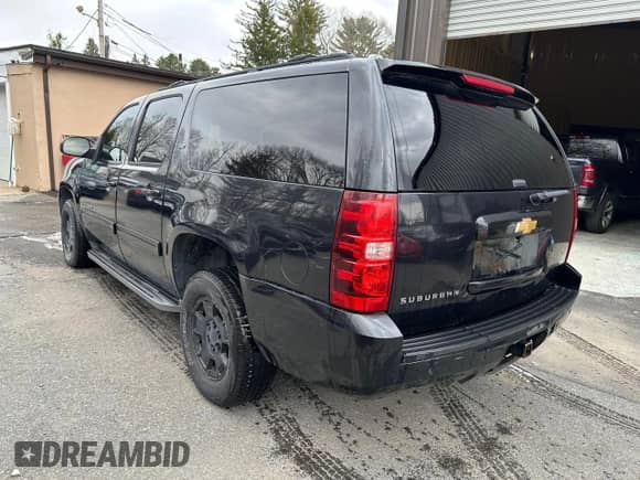 2013 Chevrolet Suburban LT с VIN 1GNSKJE78DR138778, выставлен на аукционе Copart как лот 63744065 с пробегом 100 121 миль миль и Чистый • Clean title. История ставок и продаж доступна на DreamBid. Изображение 3.