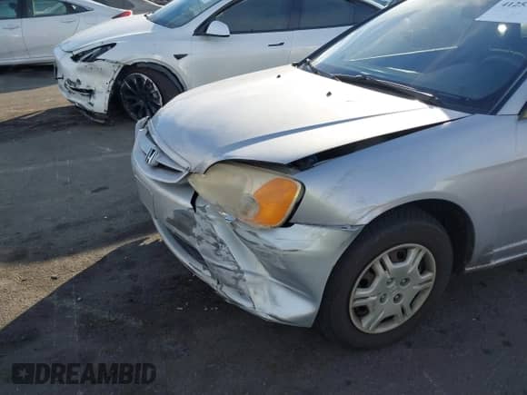 2002 Honda Civic with VIN 1HGEM21292L042403, listed as a IAAI auction lot 41253054 with 95,053 mi miles and . Bid and sale history available at DreamBid. Image 6.