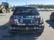 2005 MINI Hardtop with VIN WMWRC33425TC57990, listed as a Copart auction lot 86117205 with Not provided miles and Clean title. Bid and sale history available at DreamBid. Image 6.