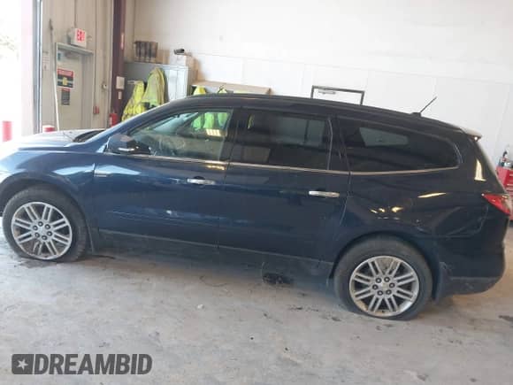 2015 Chevrolet Traverse LT with VIN 1GNKRGKD0FJ121368, listed as a IAAI auction lot 43081694 with Not provided miles and . Bid and sale history available at DreamBid. Image 13.