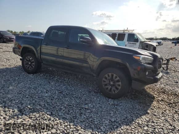 2022 Toyota Tacoma Limited with VIN 3TMGZ5AN8NM506451, listed as a Copart auction lot 56830185 with 58,941 mi miles and Salvage title. Bid and sale history available at DreamBid. Image 4.