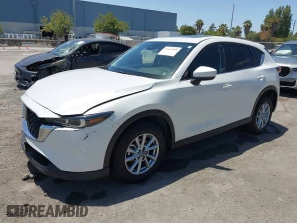2023 Mazda CX-5 S Carbon Edition z VIN JM3KFBCM9P0286384, wystawiony jako IAAI lot #42497951 z przebiegiem 9 448 mil mil oraz . Historia ofert i sprzedaży dostępna na DreamBid. Obrazek 2.
