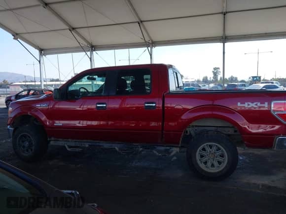 2013 Ford F-150 Lariat with VIN 1FTFW1ET5DKE88227, listed as a IAAI auction lot 43330750 with 140,077 mi miles and . Bid and sale history available at DreamBid. Image 15.