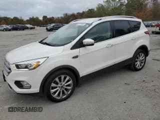2017 Ford Escape Titanium z VIN 1FMCU0JD9HUB38980, wystawiony jako Copart lot #89712745 z przebiegiem 188 124 mil mil oraz Czysty tytuł • Clean title. Historia ofert i sprzedaży dostępna na DreamBid. Obrazek 1.