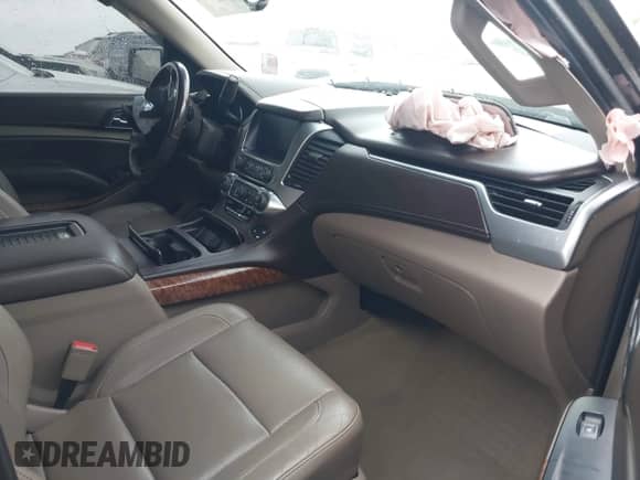 2017 Chevrolet Tahoe Premier with VIN 1GNSKCKC5HR228179, listed as a IAAI auction lot 41957145 with 157,290 mi miles and . Bid and sale history available at DreamBid. Image 5.
