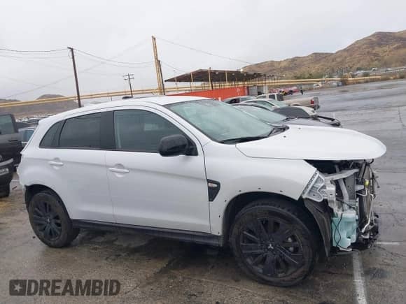 2023 Mitsubishi Outlander ES z VIN JA4ARUAU9PU014995, wystawiony jako IAAI lot #41550250 z przebiegiem 34 388 mil mil oraz . Historia ofert i sprzedaży dostępna na DreamBid. Obrazek 14.