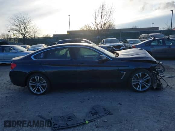 2016 BMW 4 Series 435i xDrive z VIN WBA4B3C5XGG344437, wystawiony jako IAAI lot #41240103 z przebiegiem Nie podano mil oraz . Historia ofert i sprzedaży dostępna na DreamBid. Obrazek 12.