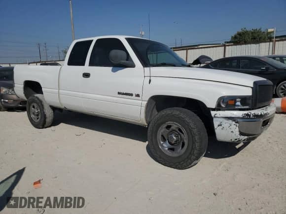 2000 Dodge 1500 with VIN 3B7HF12Y0YG147372, listed as a Copart auction lot 74925094 with 247,162 mi miles and Salvage title. Bid and sale history available at DreamBid. Image 4.