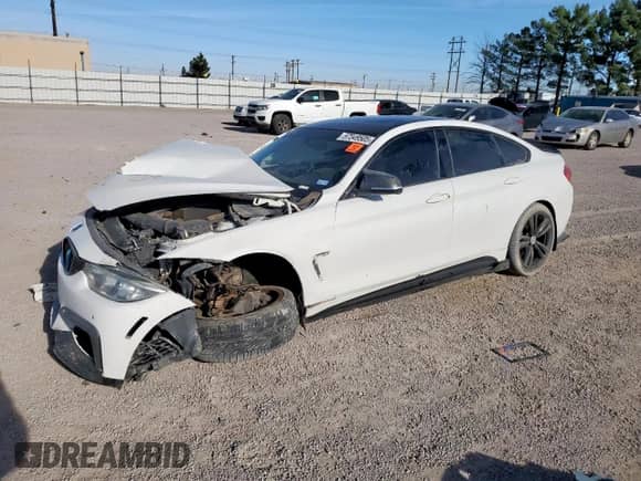 2015 BMW 4 Series 435i xDrive with VIN WBA4B3C51FD669770, listed as a Copart auction lot 57349505 with Not provided miles and Salvage title. Bid and sale history available at DreamBid. Image 1.