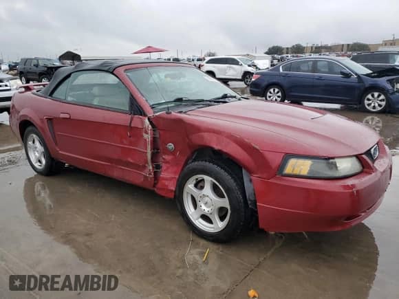 2004 Ford Mustang Deluxe с VIN 1FAFP444X4F112744, выставлен на аукционе Copart как лот 86508014 с пробегом 131 560 миль миль и Списание • Salvage title. История ставок и продаж доступна на DreamBid. Изображение 4.