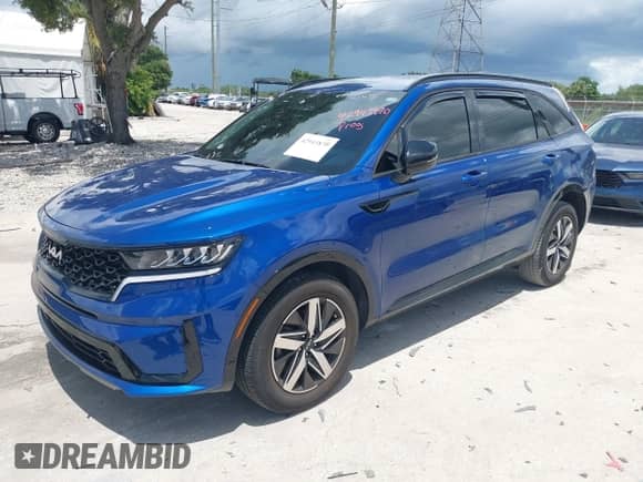 2023 Kia Sorento S with VIN 5XYRL4LC0PG166549, listed as a IAAI auction lot 42943870 with 26,510 mi miles and . Bid and sale history available at DreamBid. Image 18.