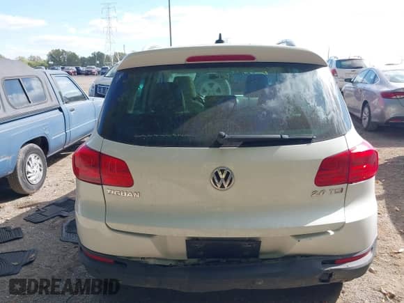 2015 Volkswagen Tiguan S with VIN WVGAV7AX8FW567004, listed as a IAAI auction lot 43396121 with 109,393 mi miles and . Bid and sale history available at DreamBid. Image 16.