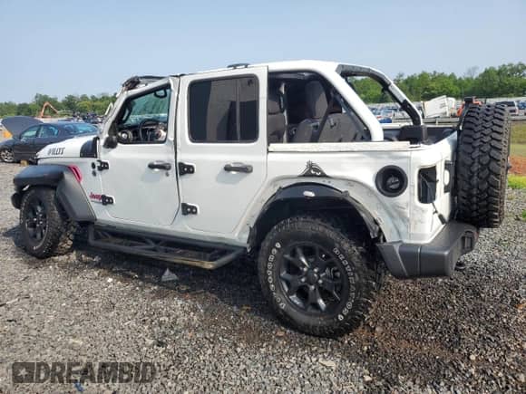 2021 Jeep Wrangler Unlimited 80th Anniversary с VIN 1C4HJXDG4MW794519, выставлен на аукционе Copart как лот 60116105 с пробегом 25 708 миль миль и Списание • Salvage title. История ставок и продаж доступна на DreamBid. Изображение 2.