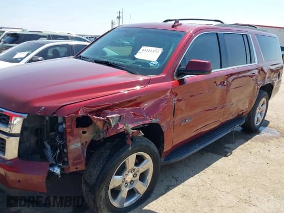 2018 Chevrolet Suburban LT z VIN 1GNSCHKC7JR392873, wystawiony jako IAAI lot #43221375 z przebiegiem 71 601 mil mil oraz . Historia ofert i sprzedaży dostępna na DreamBid. Obrazek 6.